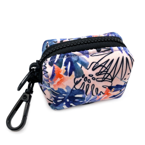 Load image into Gallery viewer, Bottom view of Pipco Pets dog poo bag dispenser with Tropic Fronds tropical leaves print pattern in blue