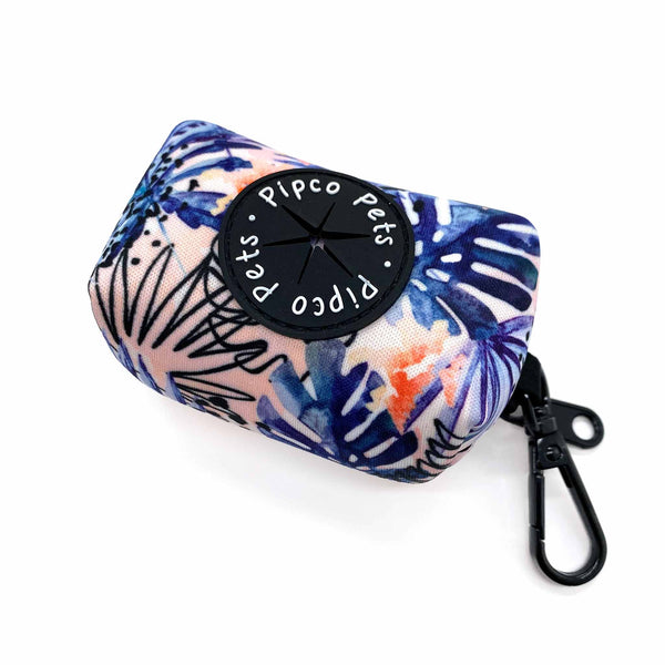 Load image into Gallery viewer, Top view of Pipco Pets dog poo bag dispenser with Tropic Fronds tropical leaves print pattern in blue
