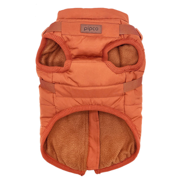 Load image into Gallery viewer, Burnt orange dog puffer jacket with built-in harness and fleece lining by Pipco Pets

