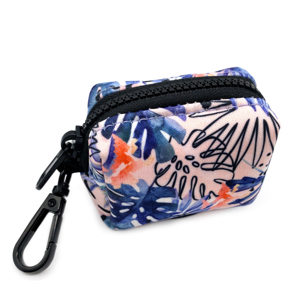 Load image into Gallery viewer, Bottom view of Pipco Pets dog poo bag dispenser with Tropic Fronds tropical leaves print pattern in blue
